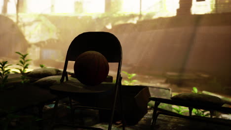 a basketball on a chair in an abandoned building