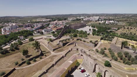 Early-modern-amoreira-aqueduct-system,-aerial-revealing-shot