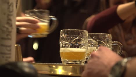 serving beer in pub