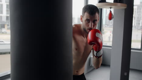 man boxing training at gym