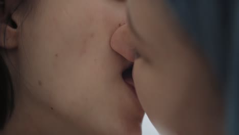 close up video of lesbian couple kissing intimately