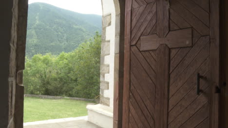 open door of a mountain church