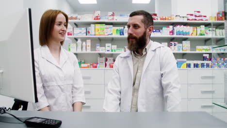 two health workers talking