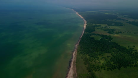 High-altitude-view-of-the-beach-and-bluffs-at-Jurkalne-Seashore,-Latvia