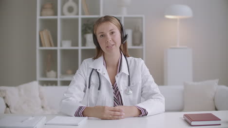 female-pediatrician-is-consulting-online-conducting-webinar-for-women-and-parents-by-video-chat-portrait-of-doctor