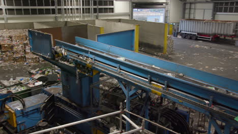 Recycling-Plant-For-Plastic-Bottles-and-Aluminum-Cans-on-a-Conveyor-Belt