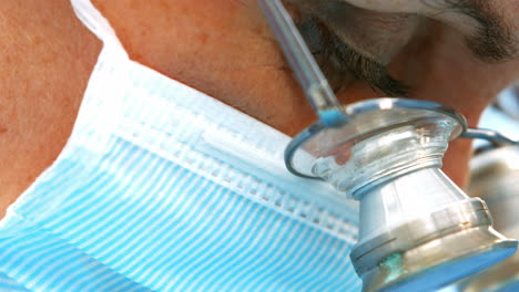 close-up of female surgeons using surgical loupes