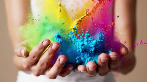 Colorful Powder Explosion in Hands