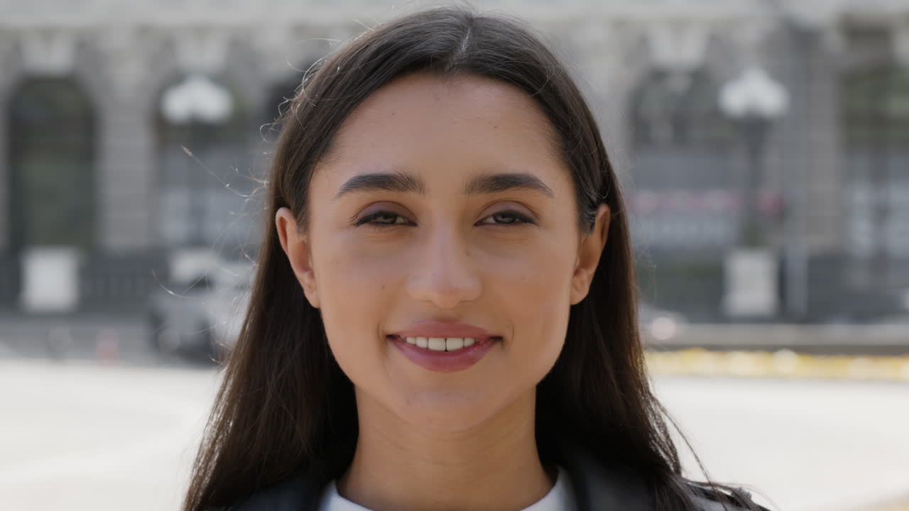 Woman putting on a mask outside