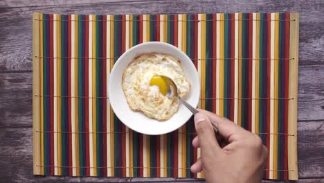 fried egg in a bowl