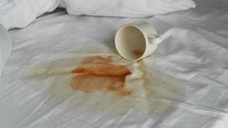 coffee spill on bed sheets