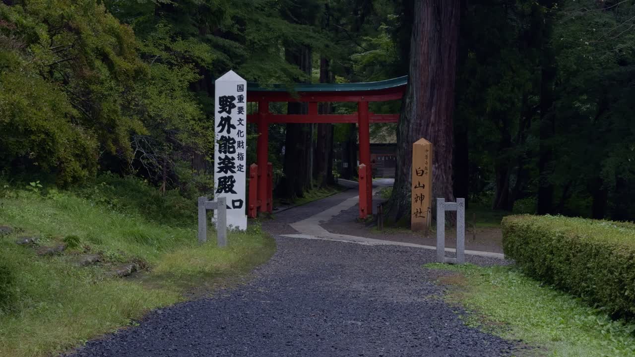Chusonji Temple in Hiraizumi: Cloudy Morning Serenity A peaceful view of Chusonji Temple in Hiraizumi, surrounded by misty morning clouds and lush greenery