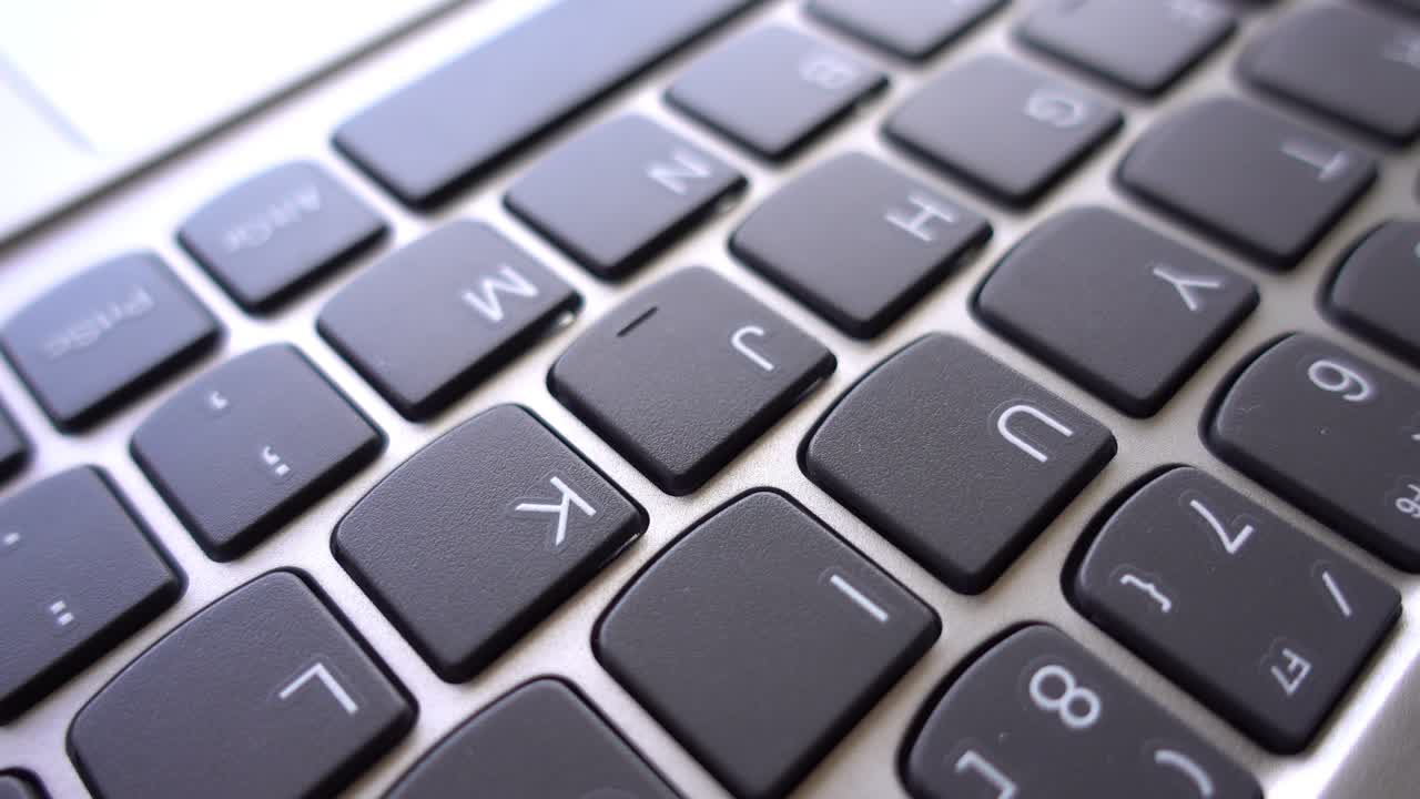 Computer Keyboard Rotates as Background