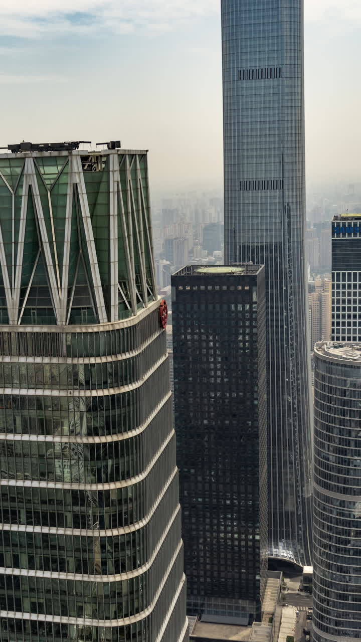 Timelapse of the Beijing city skyline from a high vantage point in vertical