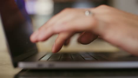 Person typing on a laptop