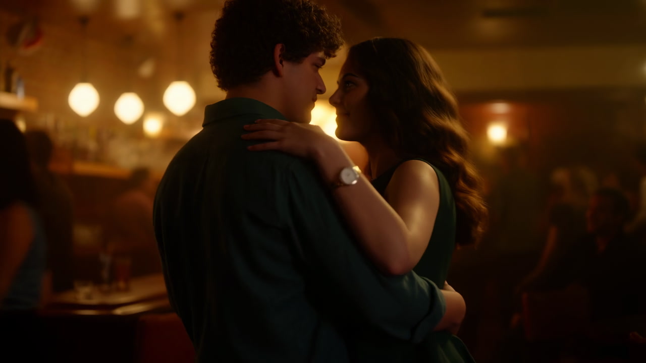 Young Couple Slow Dance Bar Warm Lamps, Dim Wooden Interior, Blurred Patrons In Background, Close Embrace