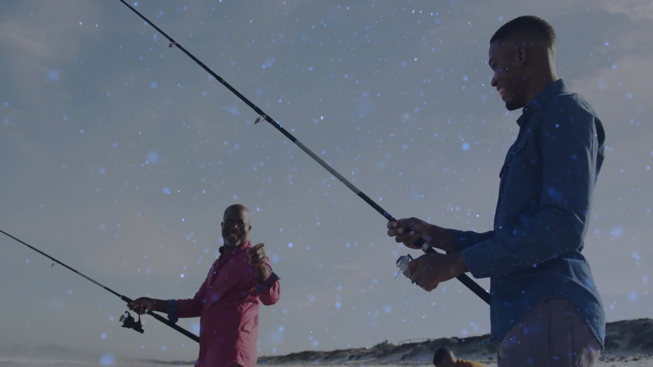 Father and son fishing on sandy beach, showing animated technology graphs and floating data points