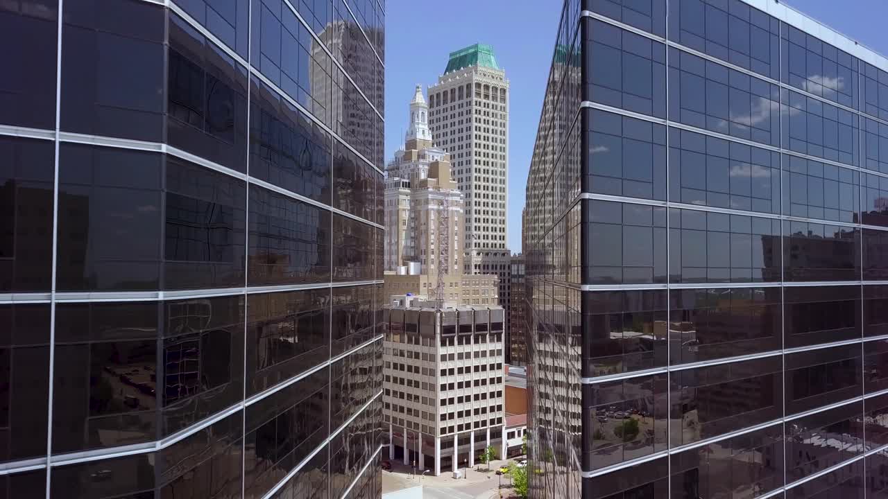 Aerial drone footage of downtown Tulsa over main street.