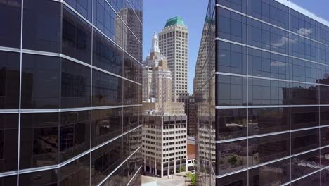 aerial drone footage of downtown tulsa over main street.