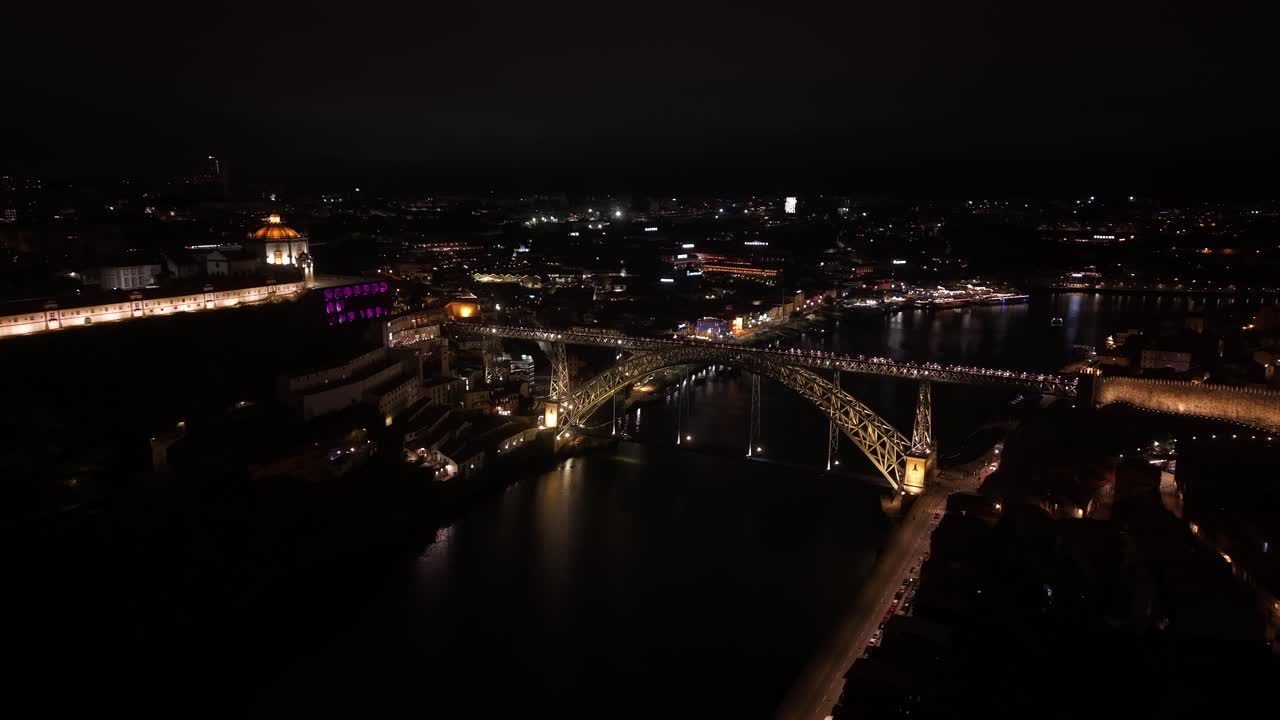 Establishing Night Aerial View of Port, Portugal, Dom Luis I Bridge and Serra do Pilar Monastery in Lights