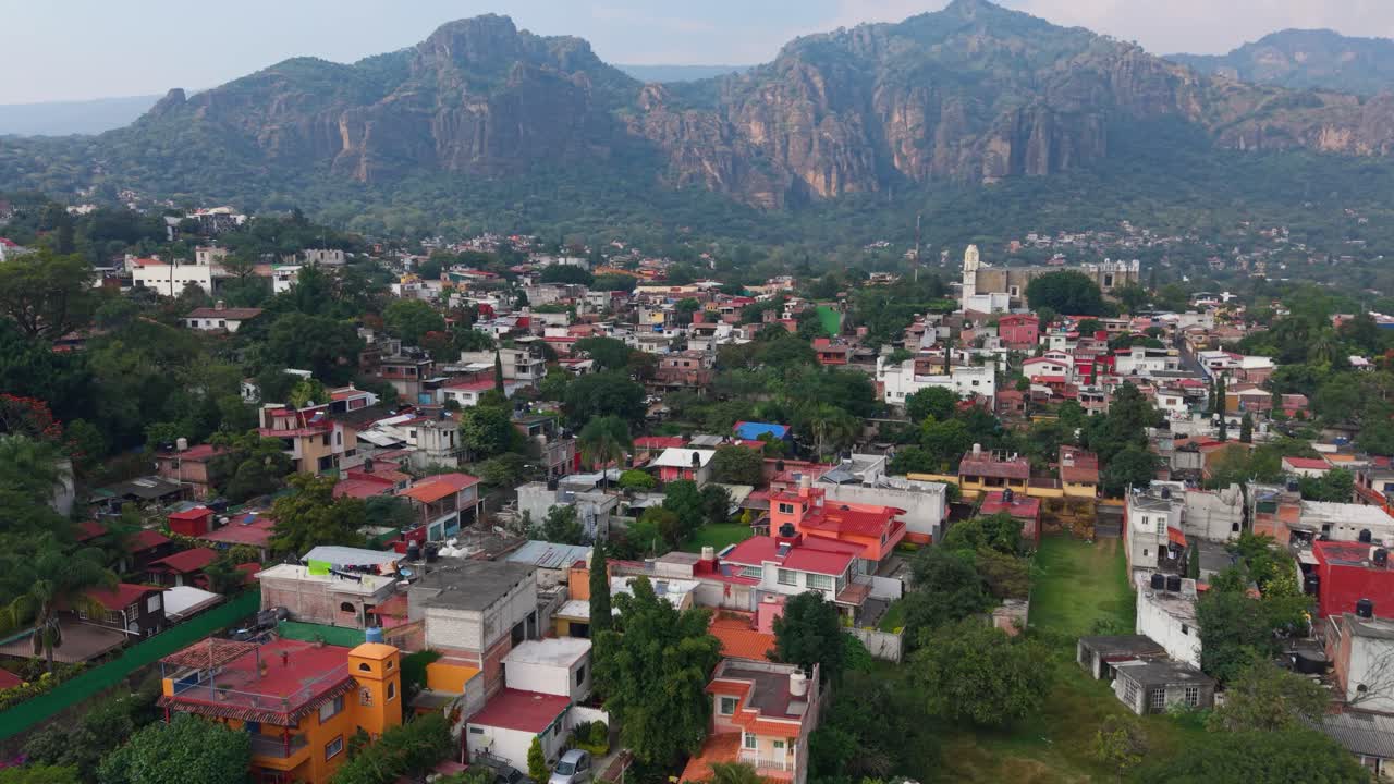 Aerial footage showing Tepoztlán, Morelos, surrounded by dramatic peaks