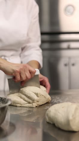 chef preparing dough for bread