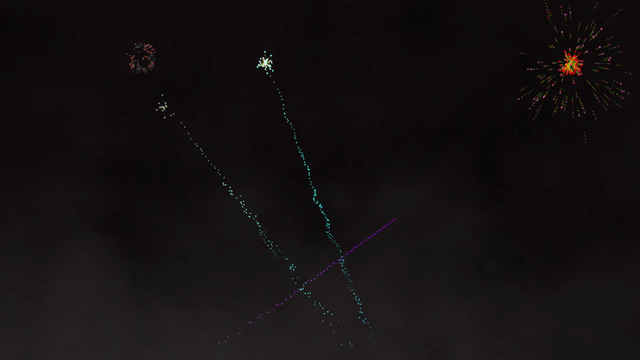 animación de fuegos artificiales verdes y rosados explotando sobre un fondo negro
