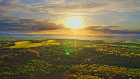 stunning dramatic aerial view of yorkshire countryside woods and fields, england