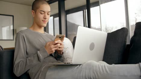 Man using mobile at home 4k