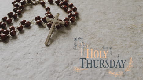 animation of holy thursday text over christian rosary on grey background