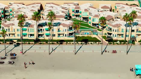 oceanside california flying left close up view of the bike path beach sand surf and hotels