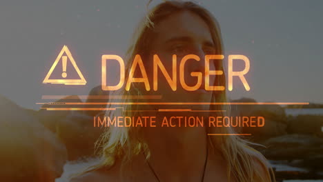 standing near rocky shoreline, person with long hair and animation warning overlay