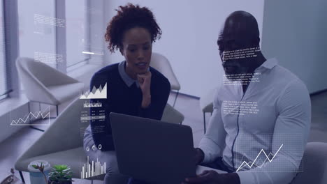 analyzing data on laptop, business colleagues with financial charts animation over them
