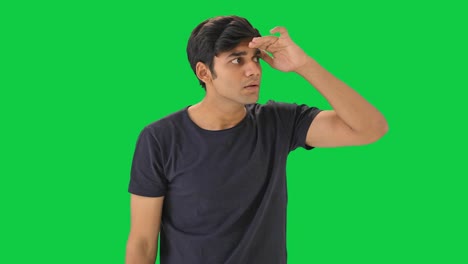 indian boy finding someone  green screen