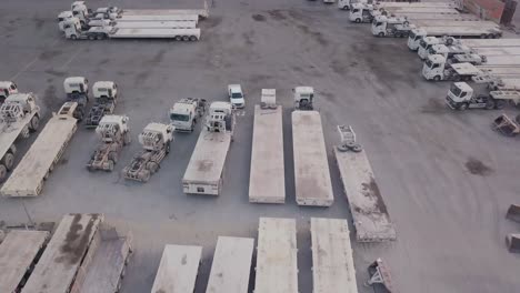 Industrial-Vehicle-Yard-Aerial-Footage-–-Fly-Backward