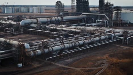 large industrial complex with extensive pipelines and storage tanks