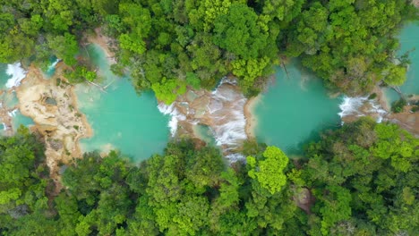 Aerial:-top-down-view-of-tropical-waterfall-pools