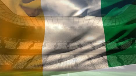 Ivorian-flag-against-soccer-stadium