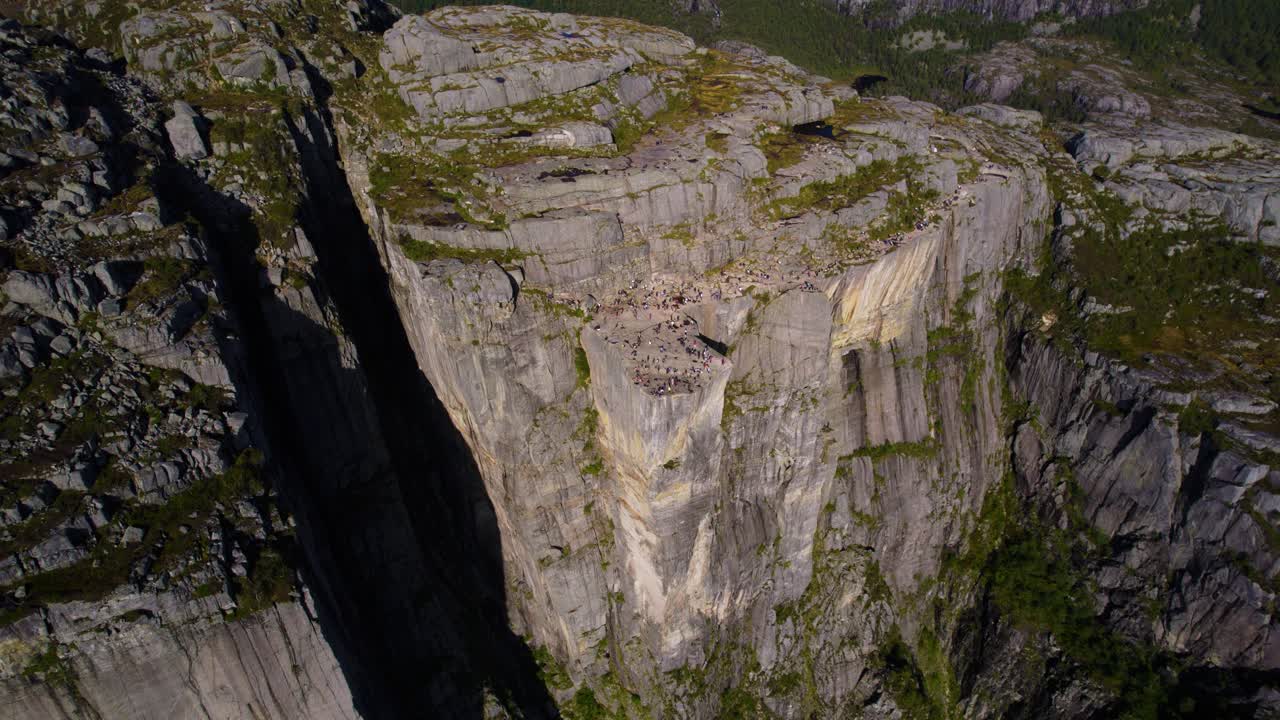 Epic aerial panorama of Preikestolen Pulpit Rock overlooking Lysefjorden and mountains in Norway.