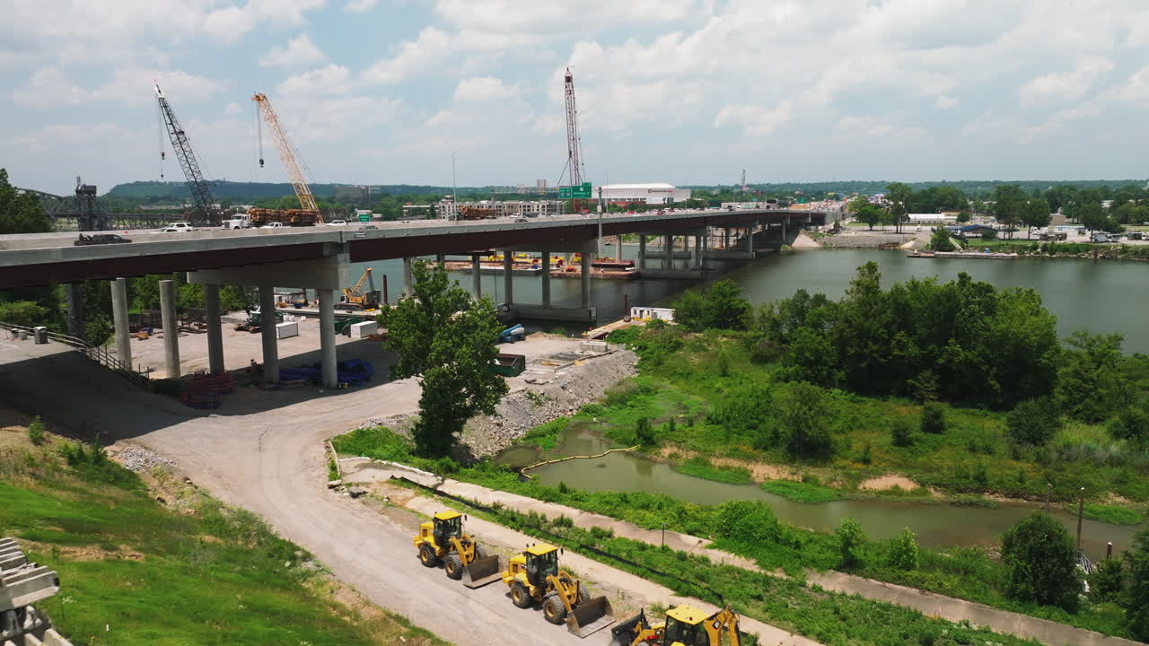 Cranes At Bridge Construction Site Across Arkansas River In Little Rock, Arkansas, USA