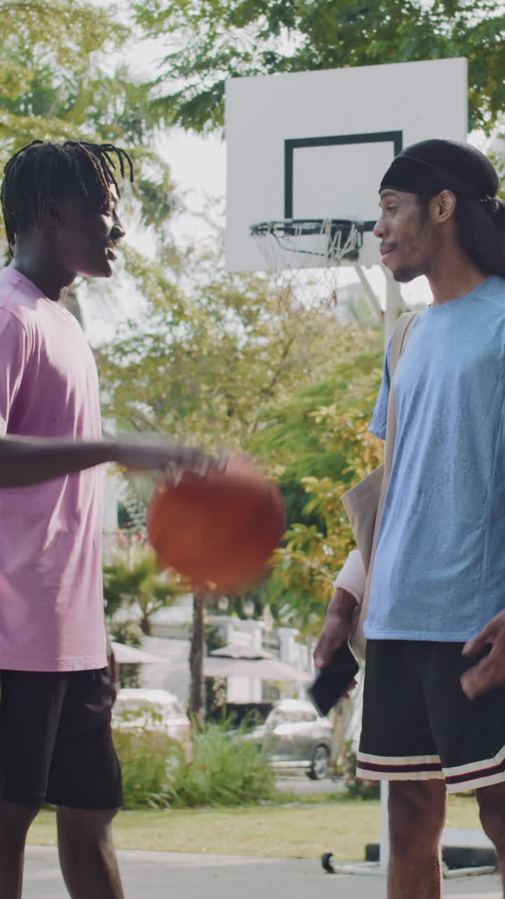 Basketball Players Checking Smartphone after Outdoor Game