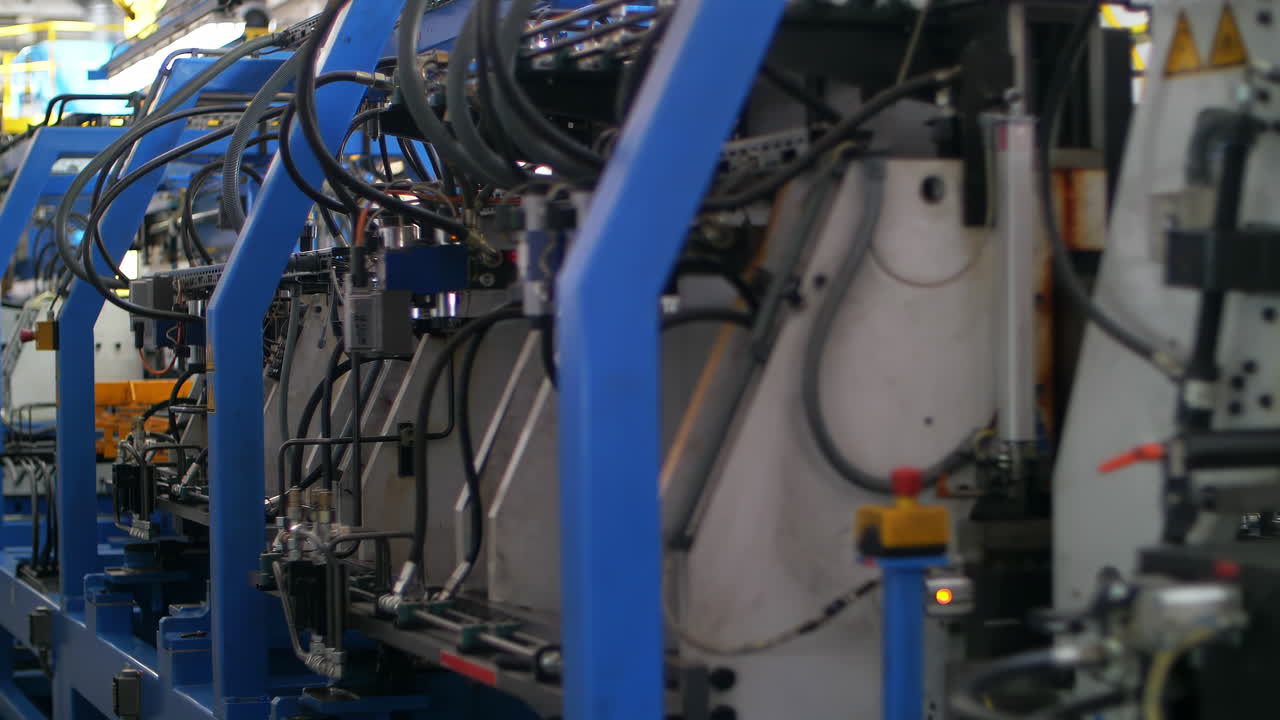 Modern industrial manufacturing facility assembly line with automated production line car manufacturing workshop, showcasing advanced technology and efficiency.