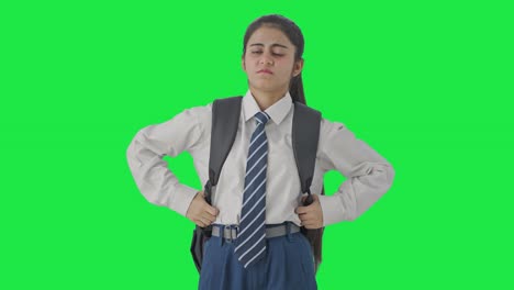 niña de escuela india cansada sintiéndose somnolienta pantalla verde