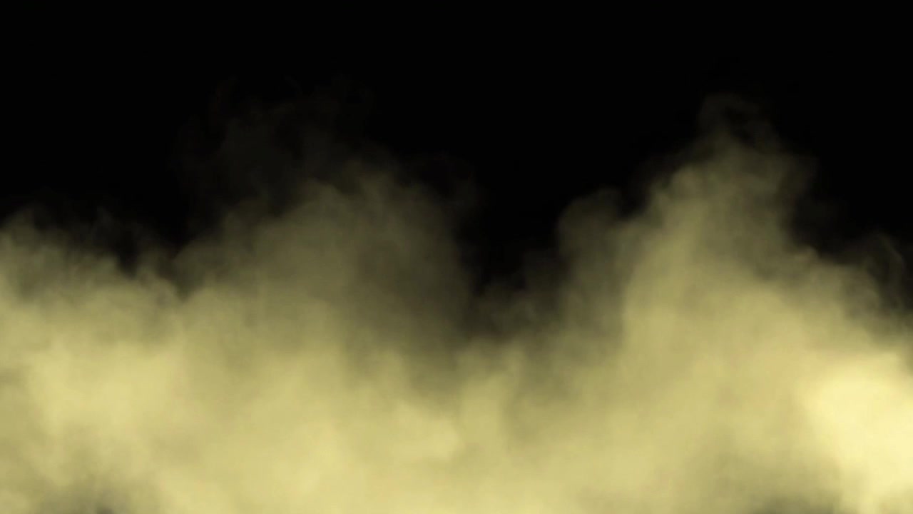 Fumo giallo che sale su uno sfondo nero