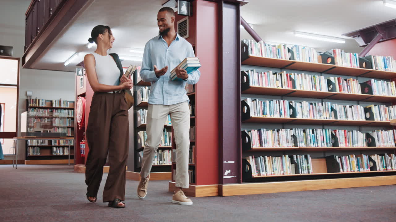 Diverse Students Walking and Discussing in a Library