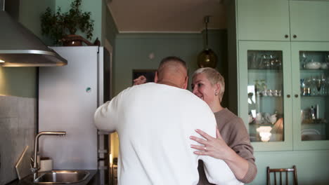 couple dancing at home