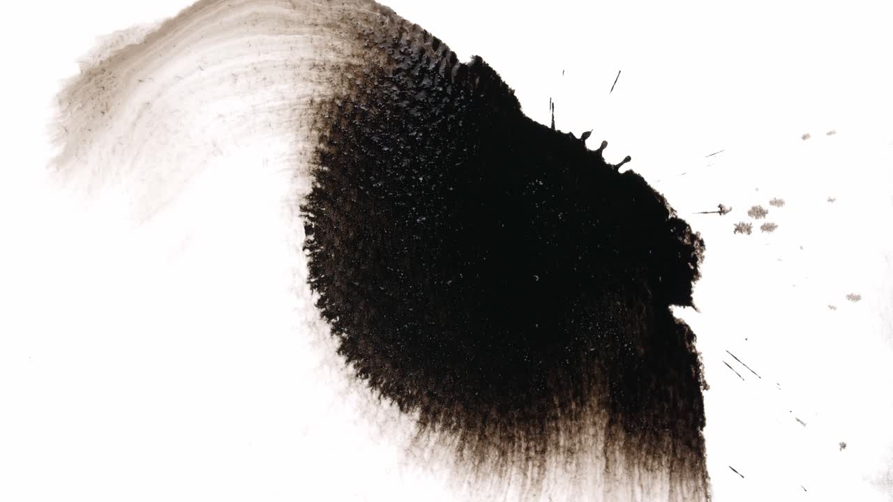 Black Ink Drops On White Background