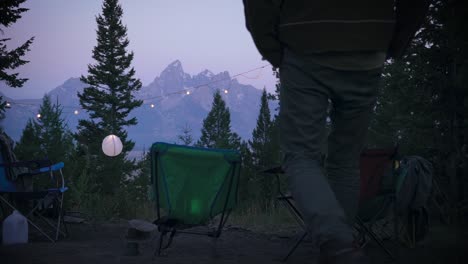 a campsite awaits the camper as he walks toward the grand teton national park in wyoming