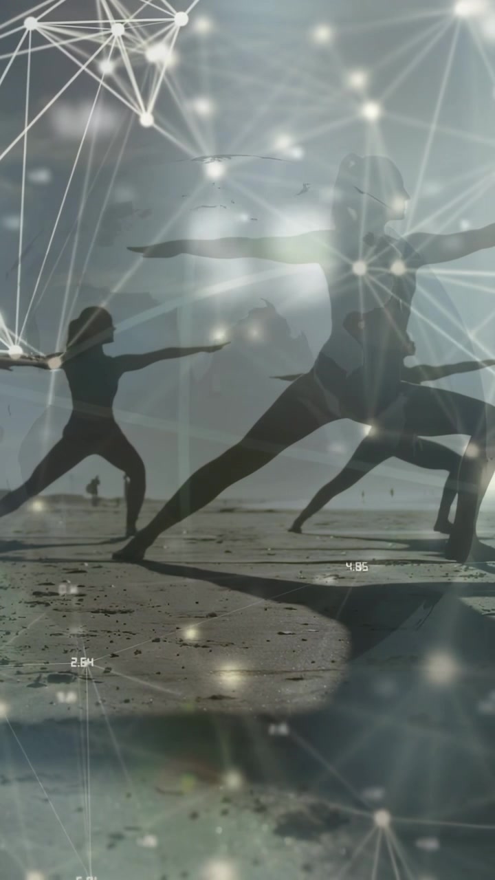 Vertical video: Women holding pose on sand, net drifting from top scanning bodies for fitness