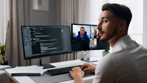 software developer working remotely and participating in a video call